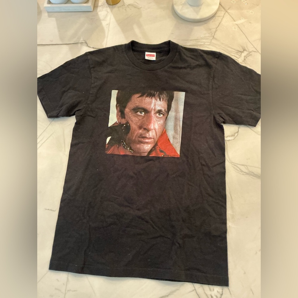 Supreme Black Graphic Tee with Iconic collectible Scarface Print.